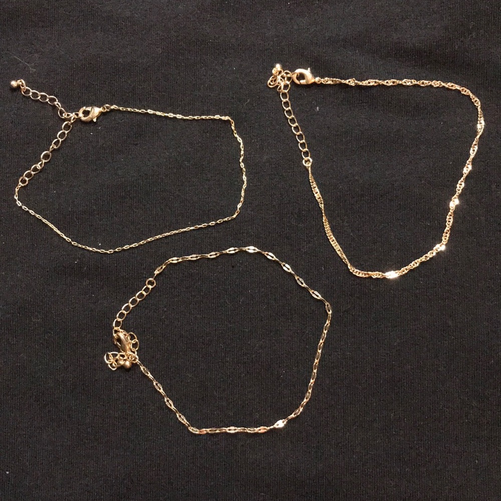 3 gold bracelets